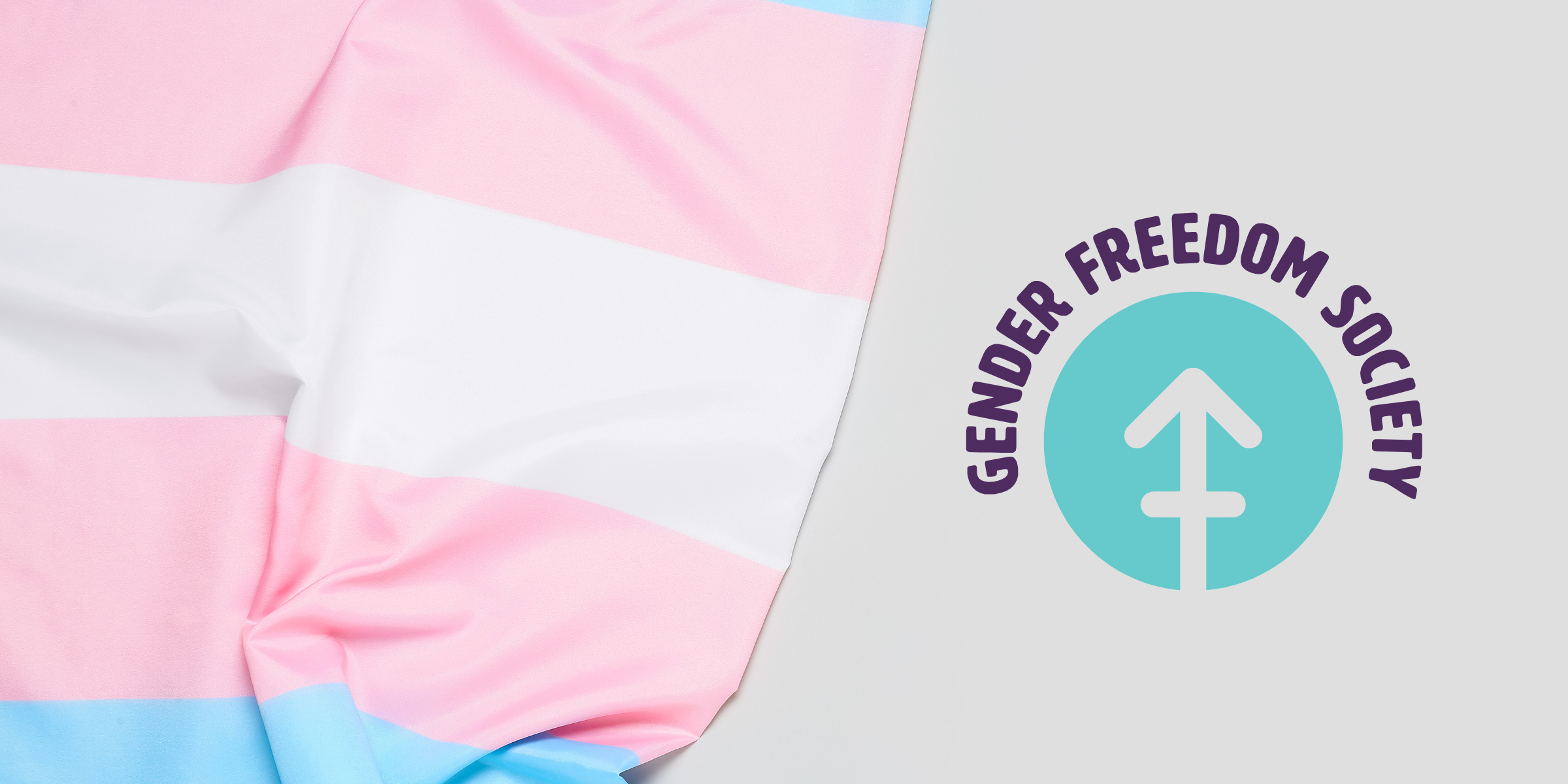 Image of a trans pride flag draped next to the Gender Freedom Society logo